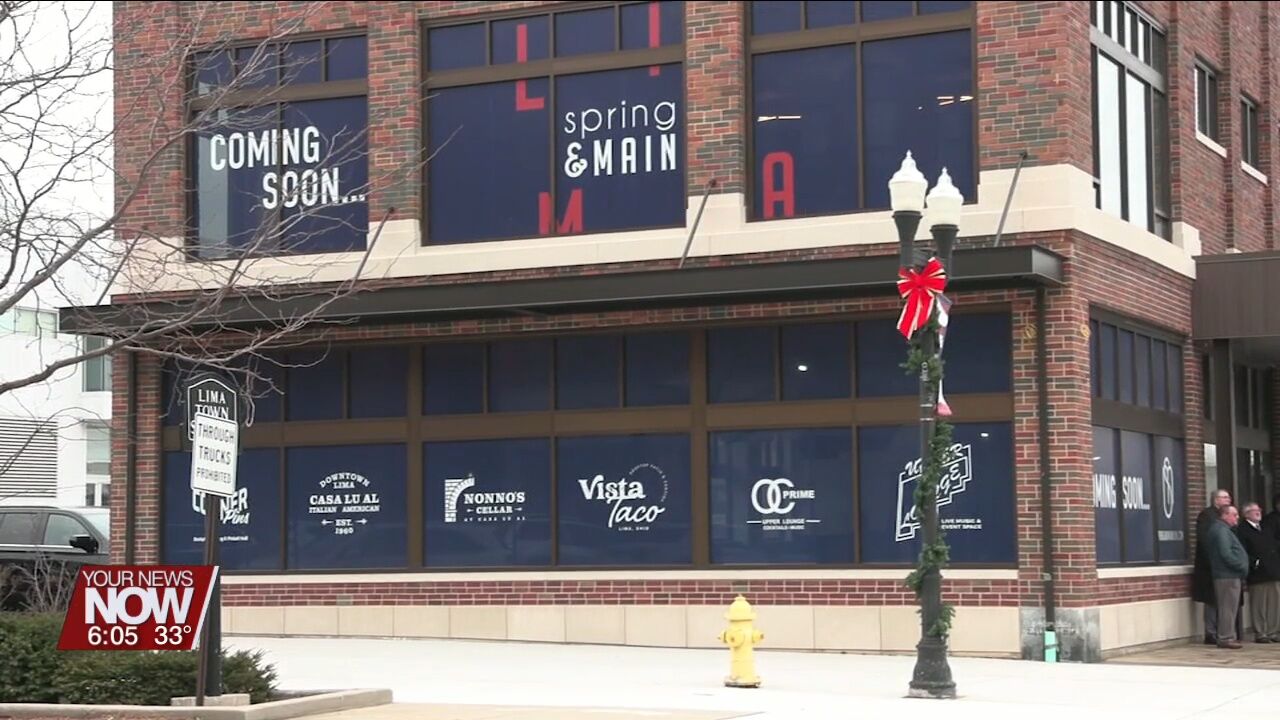 Arch placed marks a momentous moment in John Heaphy's "Spring and Main District" project